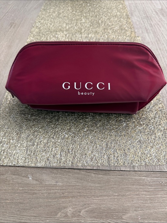 Gucci Handbags - NWOT Gucci Beauty Burgundy Cosmetic Bag